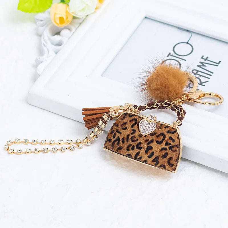 Trendy Leopard Print Mini Purse - Chic Style with Pompom & Gold Keychain”